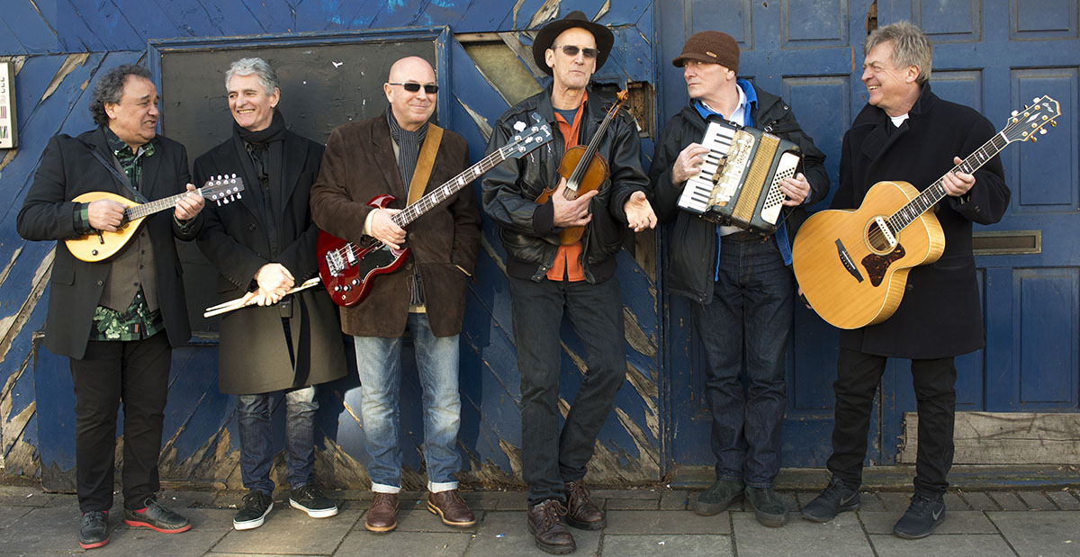 Group of musicians holding their instruments