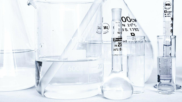 Glass test tubes and beakers in a science lab